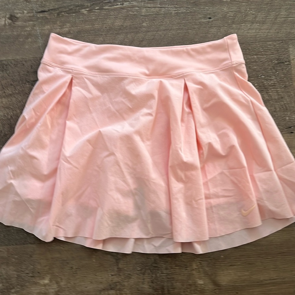 Nike golf skort.  Peach.